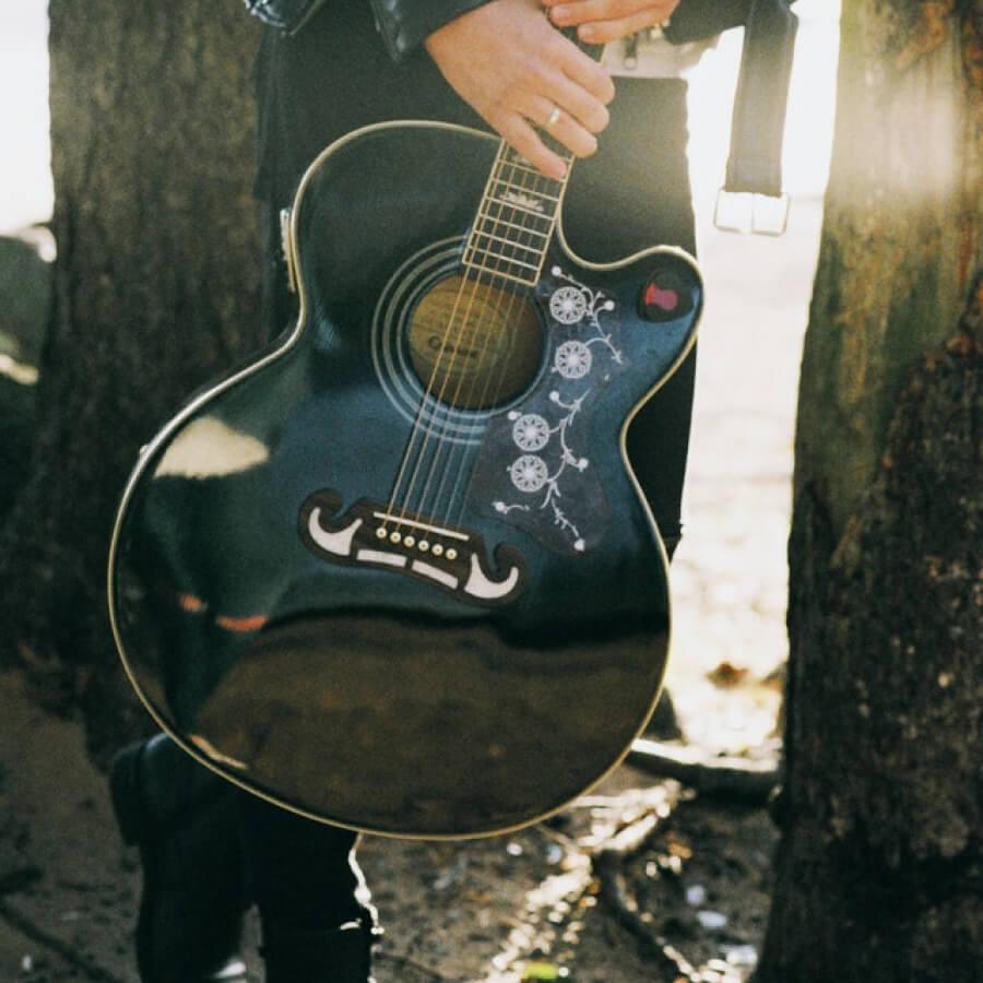 Person with a guitar